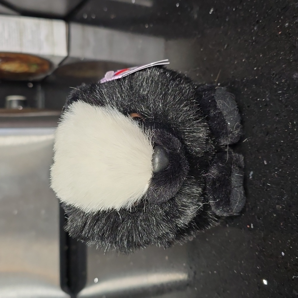 Vintage.  Collectible. Swibco Puffkins.  Odie the Skunk. DOB 12/9/97